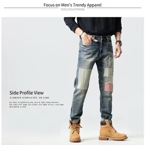 Jean homme patchwork rétro coupe droite étroite en denim bleu moyen délavé avec rayures