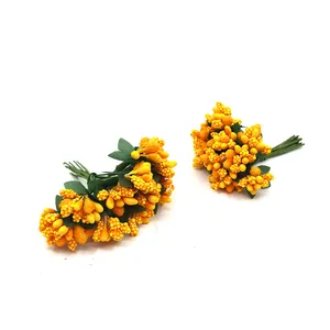 Detailed shot of yellow artificial flower stamen bundles for DIY gift box decor