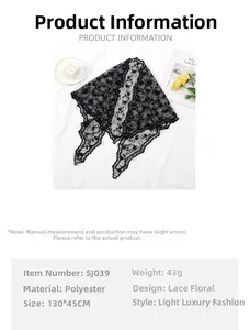 Detailed view of black floral lace triangle shawl featuring elegant polyester fabric