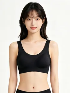 Front view of seamless black U-neck sports bra with wide straps on white background