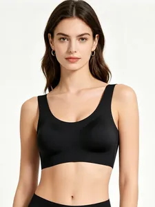 Close-up of seamless black U-neck bra with wide shoulder straps and matte fabric texture