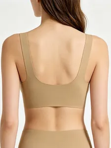 Detail view of seamless beige bra with U-shaped back design and skin-friendly fabric