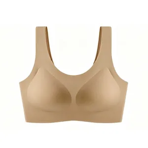 Seamless U-neck wire-free sports bra in beige with wide straps and molded cups