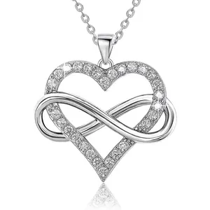 Silver infinity heart pendant necklace with shimmering zircon stones on white background
