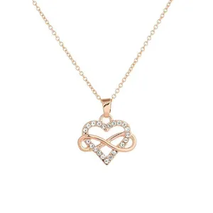 Elegant rose gold infinity heart necklace featuring sparkling white rhinestones on a fine chain