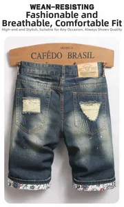 Detail of distressed denim shorts with unique floral pattern lining on the rolled cuffs