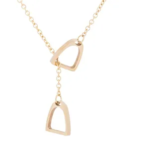 Minimalist gold stainless steel necklace featuring layered horseshoe stirrup pendants