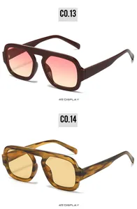 Detailed 45-degree view of burgundy and tortoiseshell pilot sunglasses with tinted lenses