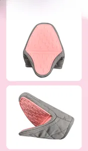 Detail of pink fish-pattern silicone oven mitt with quilted grey fabric and heat resistance