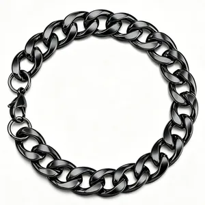 Close-up of polished black stainless steel Cuban link chain with a lobster clasp
