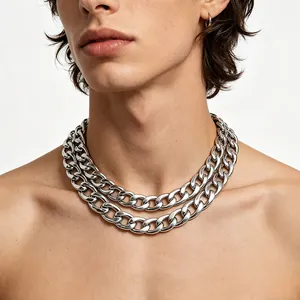 Detail of a men's chunky silver Cuban link necklace showing the stainless steel texture