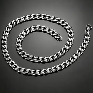 Polished titanium steel Cuban chain necklace with lobster clasp on reflective background