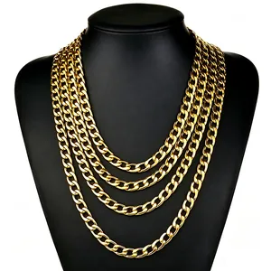 Close-up of a 4-layer golden curb chain necklace set displayed on a black mannequin