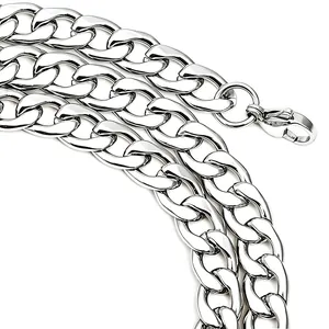 Macro detail of silver stainless steel Cuban link chain with a secure lobster clasp