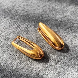 French style gold teardrop earrings with a polished mirror finish and minimalist design