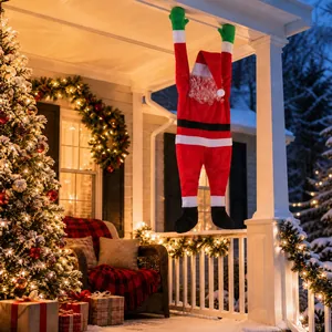 Detailed outdoor view of a climbing Santa Claus decoration on a festive porch setting