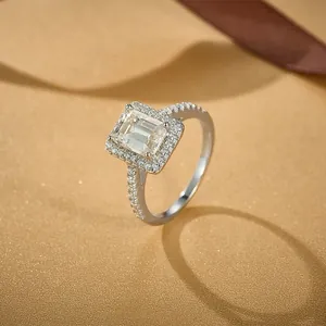 Luxurious S925 sterling silver ring with large rectangular moissanite and halo diamonds