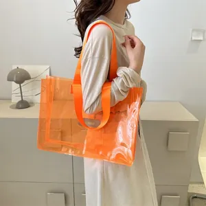 Transparent orange PVC tote bag with large capacity for summer travel and shopping use