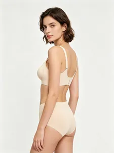 Side view of seamless nude lingerie set with wide straps and high-waisted briefs