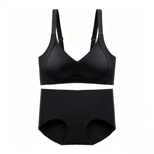 Detail view of seamless black wireless bra set with wide straps and high waist panty