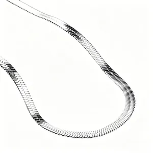 Polished silver stainless steel herringbone flat snake chain necklace on white background