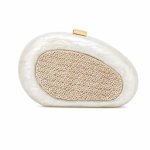 Elegant white marble acrylic shell clutch with woven raffia panel and gold clasp