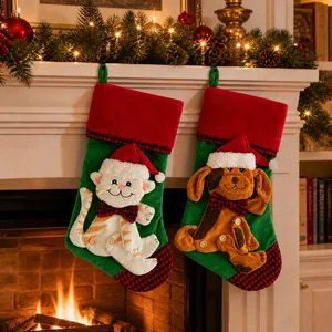 Hanging large plush Christmas stockings with cat and dog appliques on a cozy fireplace mantel