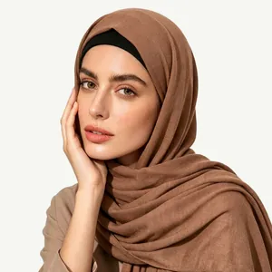 Close-up of coffee brown ethnic style hijab showing cotton-linen texture and soft draping