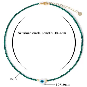 Green 2mm crystal bead necklace with 10mm evil eye heart pendant and gold clasp