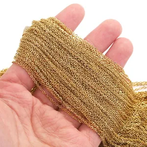 18K gold plated stainless steel O-chain necklace held in hand for sweater layering