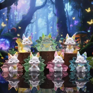 Group of colorful cartoon nine-tailed fox figures with translucent tails on wood stands