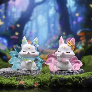 Chibi Nine-Tailed Fox figures in blue and pink themes for creative desktop decoration