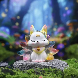 Detailed view of mythical nine-tailed fox figurine with translucent colorful tails and gold bell