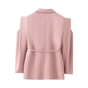 Rear view of a pink tailored blazer featuring structured padded shoulders and a slim belt