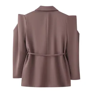 Detailed back view of a dark brown blazer featuring padded shoulders and a slim waist belt