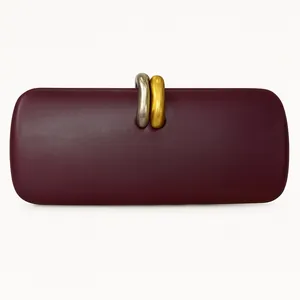 Fashionable burgundy PU leather clutch bag with minimalist gold and silver metal rings
