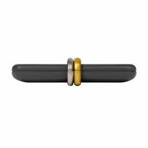 Close-up of sleek dark gray PU evening clutch with iconic gold and silver interlocking rings
