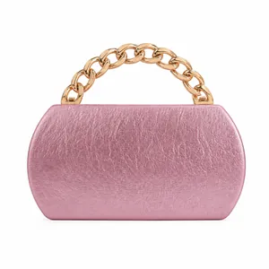 Pink metallic clutch evening bag with thick gold chain handle and ruched texture fabric