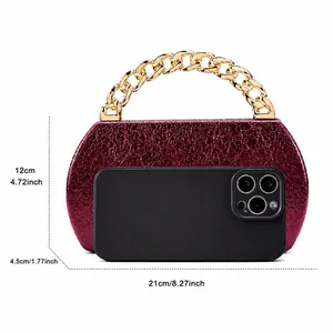 Deep red PU clutch evening bag size 21x12x4.5cm with chunky gold chain handle detail