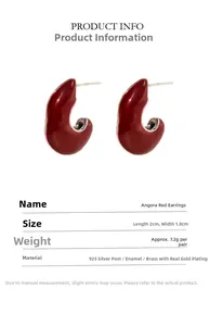 Macro detail of Angola red C-shaped enamel earrings with dimensions 2cm by 1.8cm