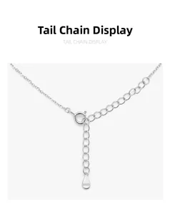 Close-up of S925 sterling silver extender chain with teardrop charm and spring clasp