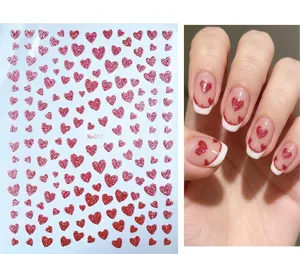 Detail of red glitter heart nail stickers with sizing information and application effect