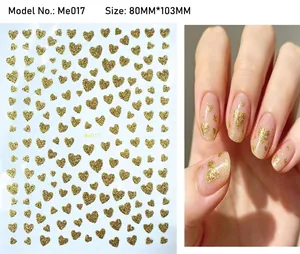 Detail of glitter heart nail stickers in gold finish with size and application display