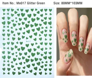 Detail of glitter green heart nail stickers with sizing specs and application view