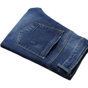 Schlanke Herren-Jeans aus Stretch-Denim in Tiefblau mit Waschung und Riss-Details