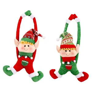 Pair of Christmas plush long-armed elves ornaments in red and green for tree decoration
