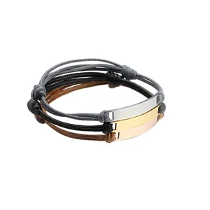 Set of three braided wax rope bracelets with adjustable knots and polished metal plates