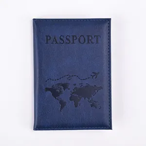 Detail of navy blue PU leather passport holder with embossed map and flight route