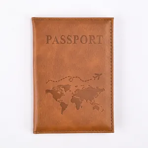 Brown textured leather passport cover with embossed world map and airplane flight path