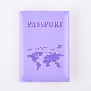 Detailed view of lavender PU leather passport cover with world map and plane design